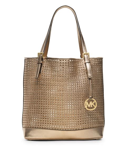 michael kors shiny gold purse|michael kors gold purse large.